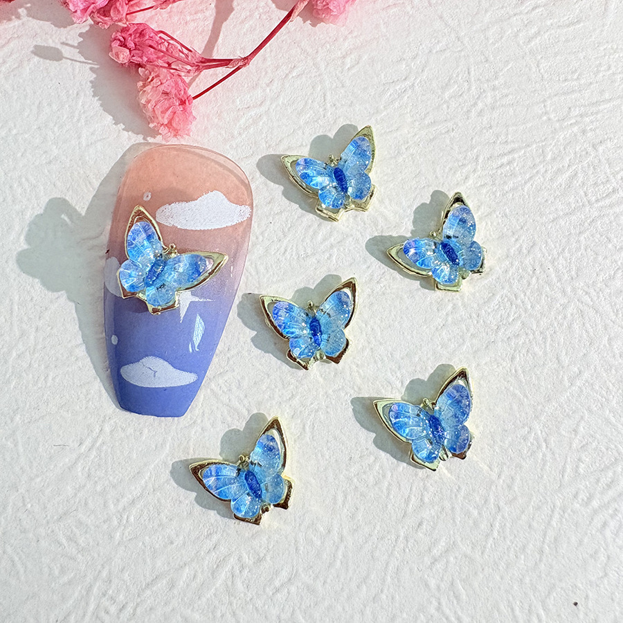 10Pcs/Pack Iridescent Butterfl - مراجعة Nail Art Viral وسعره